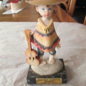 BOY FIGURINE WITH A GUITAR  5"